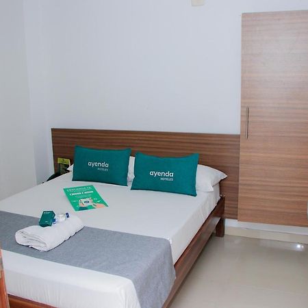Ayenda 1501 Metropolitana Plaza Hotel บูการามังกา ภายนอก รูปภาพ