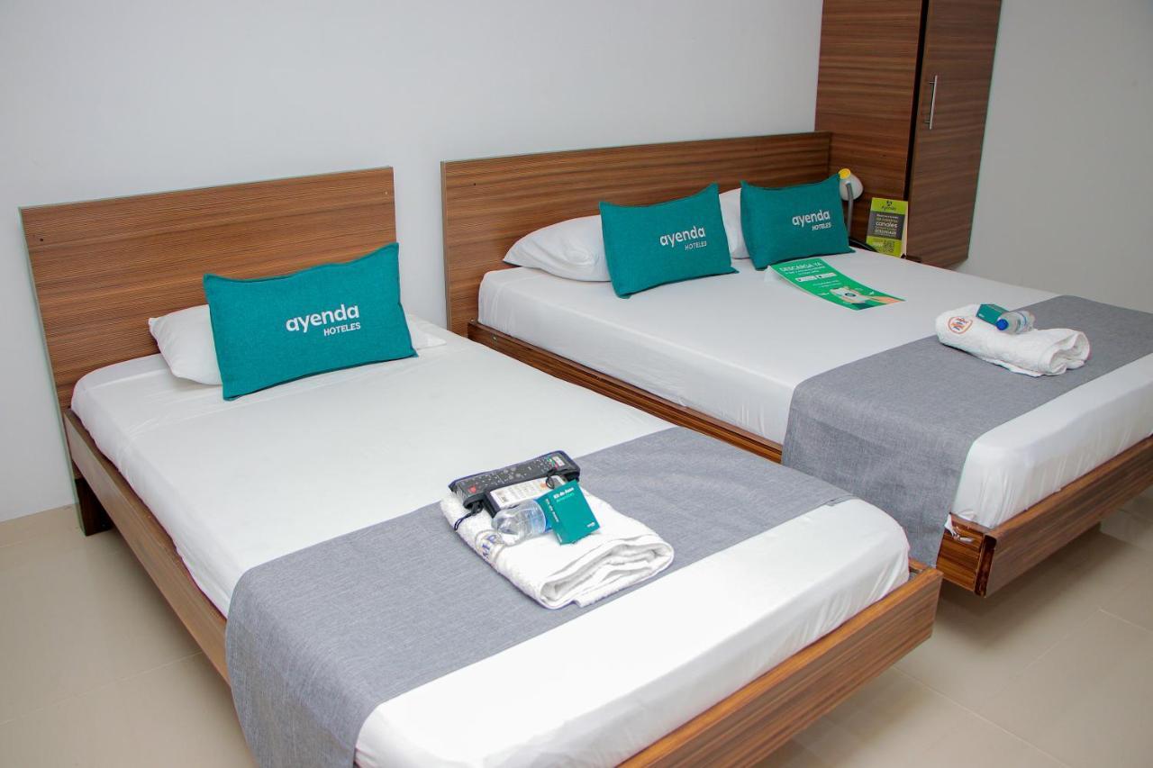 Ayenda 1501 Metropolitana Plaza Hotel บูการามังกา ภายนอก รูปภาพ